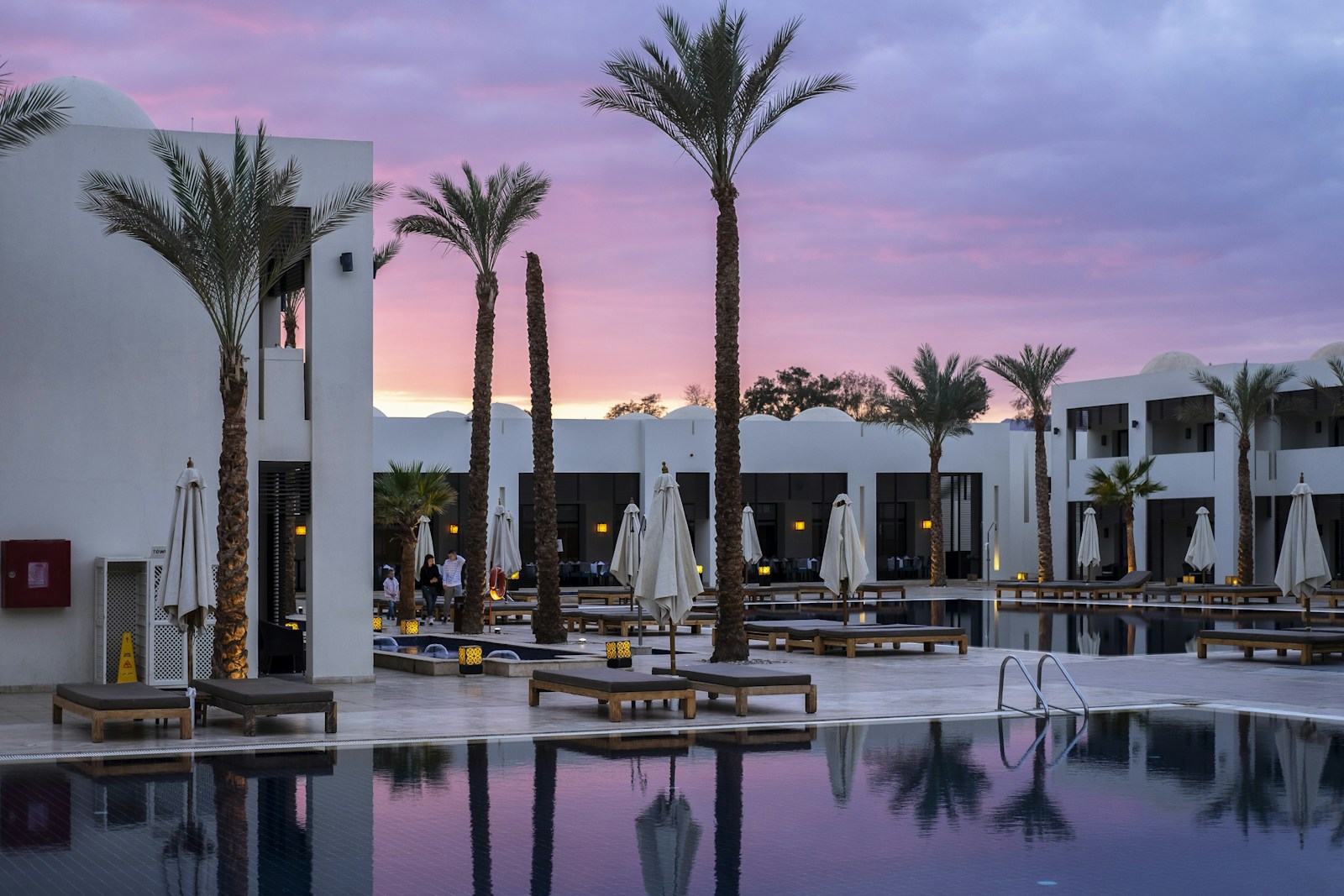 Luxury resort pool at dusk